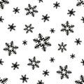 Vector seamless pattern of black-white snowflakes. Royalty Free Stock Photo